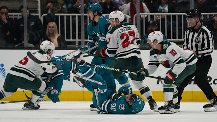 Apr 13, 2024; San Jose, California, USA; San Jose Sharks right wing Justin Bailey (90) falls to the