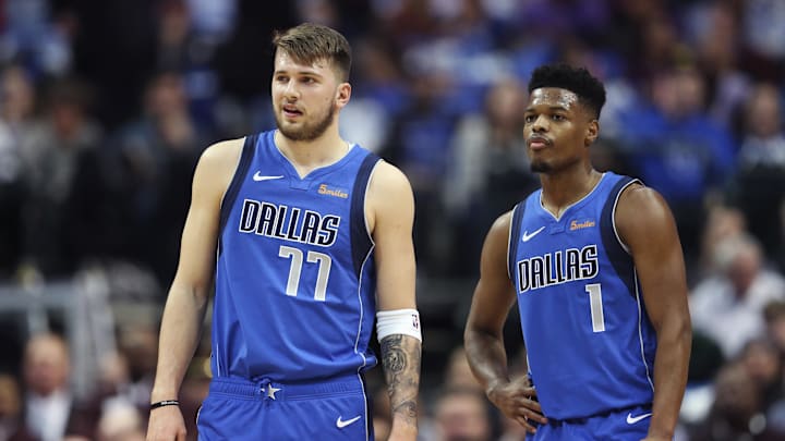 Jan 22, 2019; Dallas, TX, USA; Dallas Mavericks forward Luka Doncic (77) and  guard Dennis Smith Jr. (1) during the first quarter against the LA Clippers at American Airlines Center. Mandatory Credit: Kevin Jairaj-Imagn Images