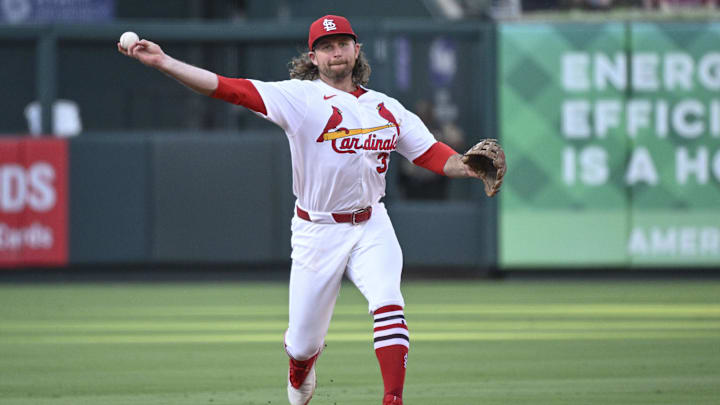 Jun 23, 2025; St. Louis, Missouri, USA; St. Louis Cardinals second baseman Brendan Donovan (33) throws to first for an out against the Chicago Cubs in the third inning at Busch Stadium. Mandatory Credit: Joe Puetz-Imagn Images