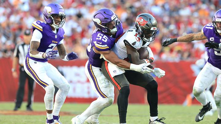 Minnesota Vikings linebacker Eric Wilson (55) tackles Tampa Bay Buccaneers wide receiver Chris Godwin Jr. (14) during the second halfat Raymond James Stadium. Minnesota Vikings linebacker Eric Wilson (55) tackles Tampa Bay Buccaneers wide receiver Chris Godwin Jr. (14) during the second halfat Raymond James Stadium.