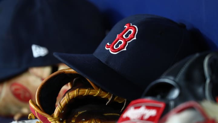 Sep 20, 2019; St. Petersburg, FL, USA; A detail view of Boston Red Sox hats and gloves at Tropicana Field. Mandatory Credit: Kim Klement-USA TODAY Sports Sep 20, 2019; St. Petersburg, FL, USA; A detail view of Boston Red Sox hats and gloves at Tropicana Field. Mandatory Credit: Kim Klement-USA TODAY Sports