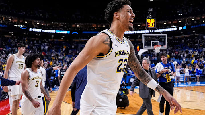 Michigan forward Yaxel Lendeborg (23) celebrates on court after 95-72 win over Saint Louis at the NCAA Tournament Second Round at KeyBank Center in Buffalo on Saturday, March 21, 2026.