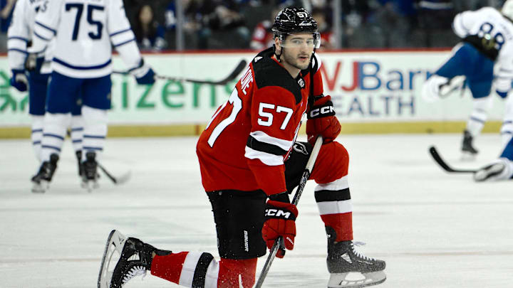 Apr 9, 2024; Newark, New Jersey, USA; New Jersey Devils defenseman Nick DeSimone (57) warms up before a game against the Toronto Maple Leafs at Prudential Center. Mandatory Credit: John Jones-Imagn Images