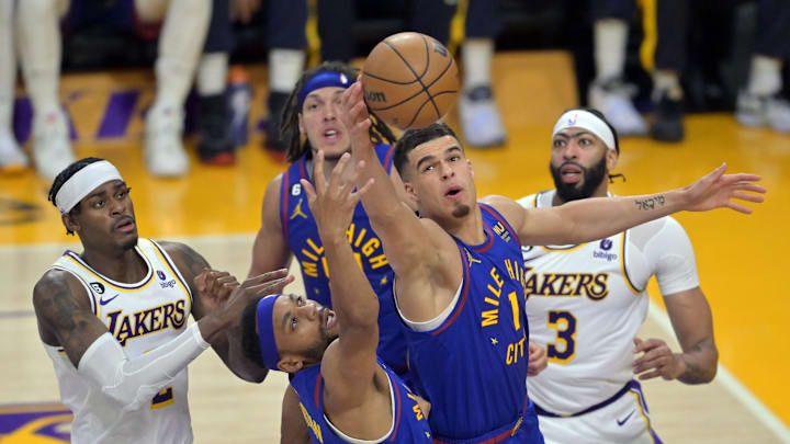 May 20, 2023; Los Angeles, California, USA; Denver Nuggets forward Michael Porter Jr. (1) and forward Bruce Brown (11) go for a rebound against the Los Angeles Lakers in the second half during game three of the Western Conference Finals for the 2023 NBA playoffs at Crypto.com Arena. Mandatory Credit: Jayne Kamin-Oncea-Imagn Images May 20, 2023; Los Angeles, California, USA; Denver Nuggets forward Michael Porter Jr. (1) and forward Bruce Brown (11) go for a rebound against the Los Angeles Lakers in the second half during game three of the Western Conference Finals for the 2023 NBA playoffs at Crypto.com Arena. Mandatory Credit: Jayne Kamin-Oncea-Imagn Images