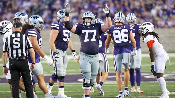 Aug 31, 2024; Manhattan, Kansas, USA; Kansas State Wildcats offensive lineman Carver Willis (77) celebrates a field goal during the third quarter against the Tennessee-Martin Skyhawks at Bill Snyder Family Football Stadium. Mandatory Credit: Scott Sewell-Imagn Images