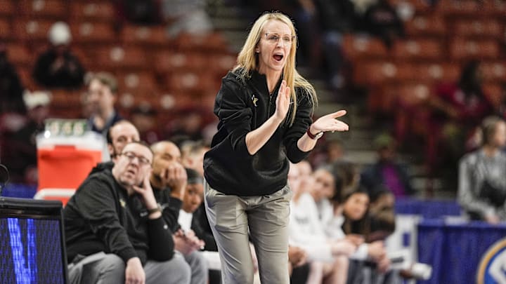 Vanderbilt Commodores head coach Shea Ralph cheers on her team against the South Carolina Gamecocks at Bon Secours Wellness Arena.