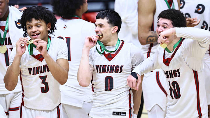 Princeton players Rognny Santiago Lugo, Sabastian Jordan Ramos and Kenny Pope celebrate after their OHSAA DI state championship win over Hilliard Bradley Sunday, March 22, 2026.