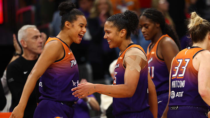 Aug 7, 2025; Phoenix, Arizona, USA; Phoenix Mercury forward Alyssa Thomas (right) celebrates with Satou Sabally after becoming the first player in WNBA history to record three triple-doubles in a row against the Indiana Fever at PHX Arena. Mandatory Credit: Mark J. Rebilas-Imagn Images