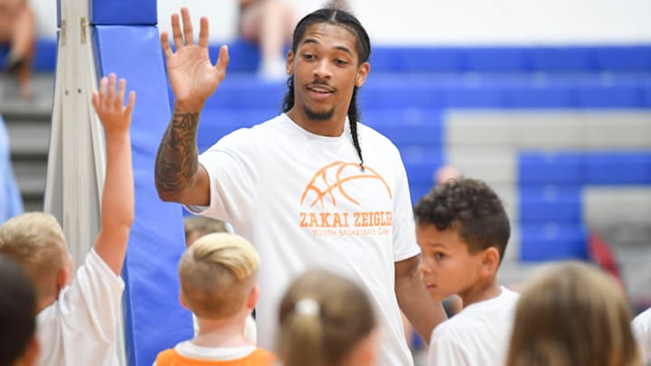 Tennessee Vols’ Zakai Zeigler introduces himself to young basketball players at a basketball camp run by the Vols’ Zakai Zeigler, at Grace Christian Academy in Karns, Tenn., Saturday, July 13, 2024.