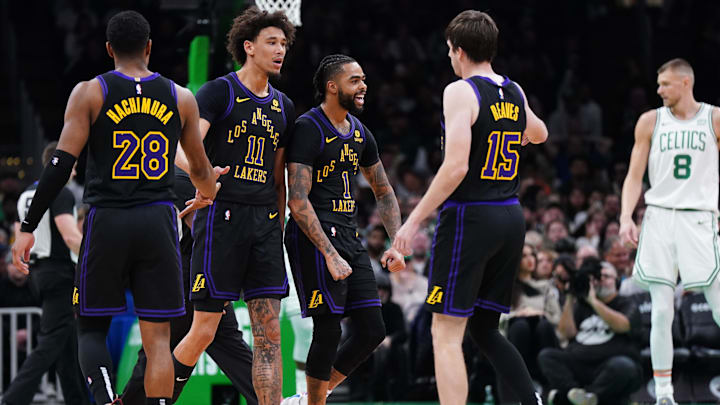 Feb 1, 2024; Boston, Massachusetts, USA; Los Angeles Lakers center Jaxson Hayes (11) celebrates with forward Rui Hachimura (28) and guards D'Angelo Russell (1) and Austin Reaves (15).