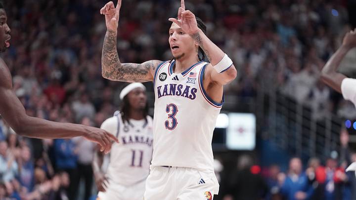Kansas Jayhawks guard Tre White (3) calls out a play after scoring a free throw against Arizona Wildcats during the game inside Allen Fieldhouse on Feb. 9, 2026. Kansas Jayhawks guard Tre White (3) calls out a play after scoring a free throw against Arizona Wildcats during the game inside Allen Fieldhouse on Feb. 9, 2026.