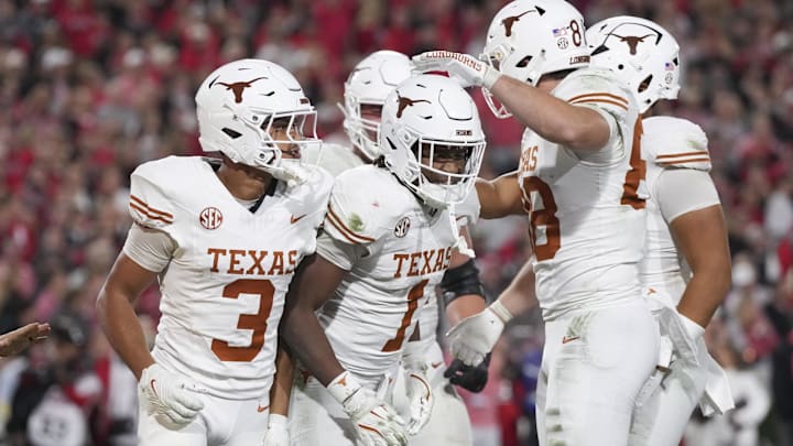 Texas Longhorns wide receiver Ryan Wingo celebrates scoring a touchdown with teammates in the second half against the Georgia Bulldogs at Sanford Stadium. 
