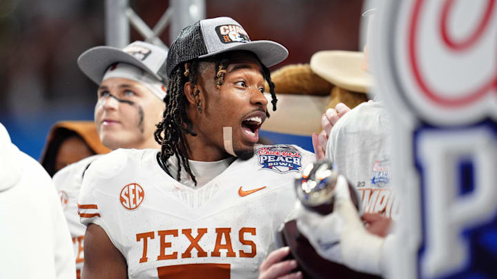 Jan 1, 2025; Atlanta, GA, USA; Texas Longhorns wide receiver Isaiah Bond (7) after winning the Peach Bowl at Mercedes-Benz Stadium. Mandatory Credit: Dale Zanine-Imagn Images Jan 1, 2025; Atlanta, GA, USA; Texas Longhorns wide receiver Isaiah Bond (7) after winning the Peach Bowl at Mercedes-Benz Stadium. Mandatory Credit: Dale Zanine-Imagn Images