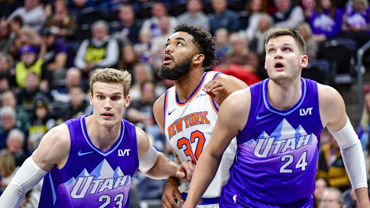 Nov 23, 2024; Salt Lake City, Utah, USA; Utah Jazz forward/center Lauri Markkanen (23) and center Walker Kessler (24) battle for position against New York Knicks center/forward Karl-Anthony Towns (32) during a free-throw during the first half at the Delta Center. Mandatory Credit: Christopher Creveling-Imagn Images