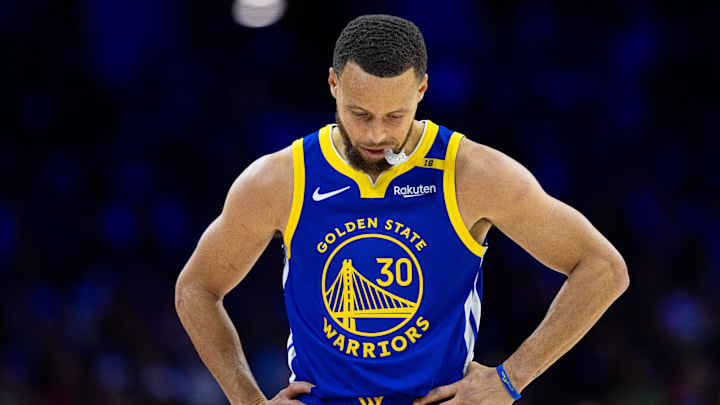 Mar 1, 2025; Philadelphia, Pennsylvania, USA; Golden State Warriors guard Stephen Curry (30) looks on against the Philadelphia 76ers during the second quarter at Wells Fargo Center. Mandatory Credit: Bill Streicher-Imagn Images