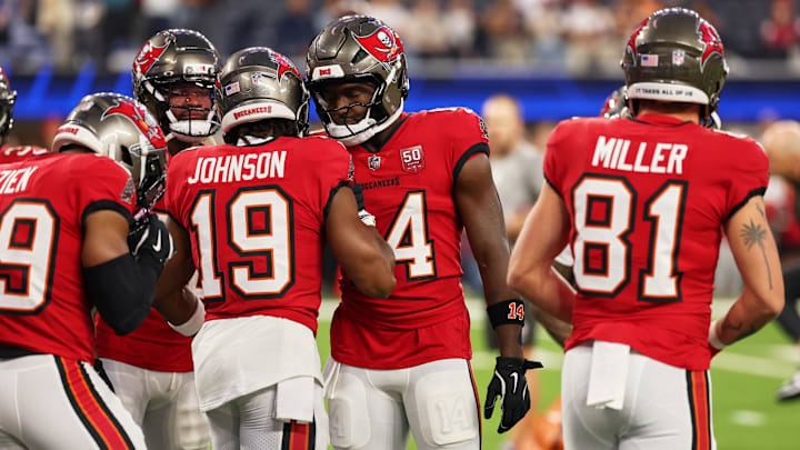 The Buccaneers are favored against the Cardinals in NFL Week 13 action.