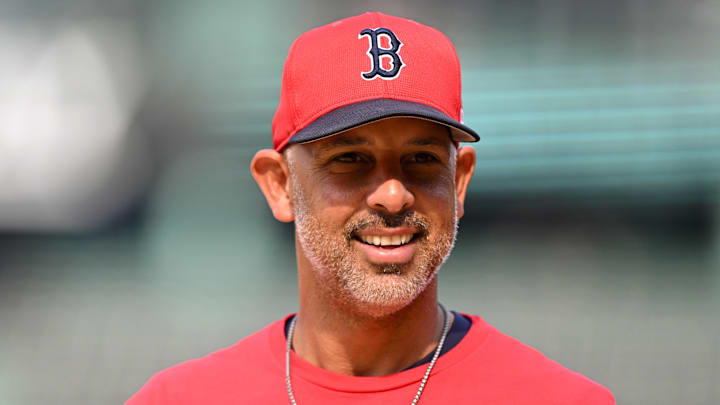 Aug 14, 2024; Boston, Massachusetts, USA; Boston Red Sox manager Alex Cora walks onto the field before a game against the Texas Rangers at Fenway Park.