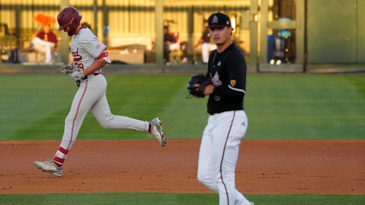 Arizona State University pitcher Khristian Curtis (5) reacts after giving up a home run to Jake Sapien (39) of Stanford at Phoenix Municipal Stadium on May 6, 2023.