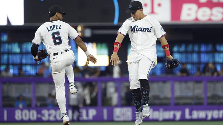 Miami Marlins shortstop Otto Lopez and left fielder Heriberto Hernandez.