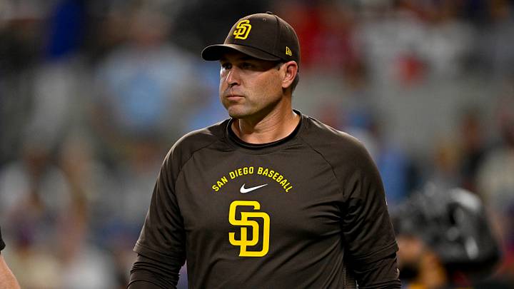 Jun 19, 2026; Arlington, Texas, USA; San Diego Padres manager Craig Stammen walks back to the dugout during the fourth inning against the Texas Rangers at Globe Life Field. Mandatory Credit: Jerome Miron-Imagn Images