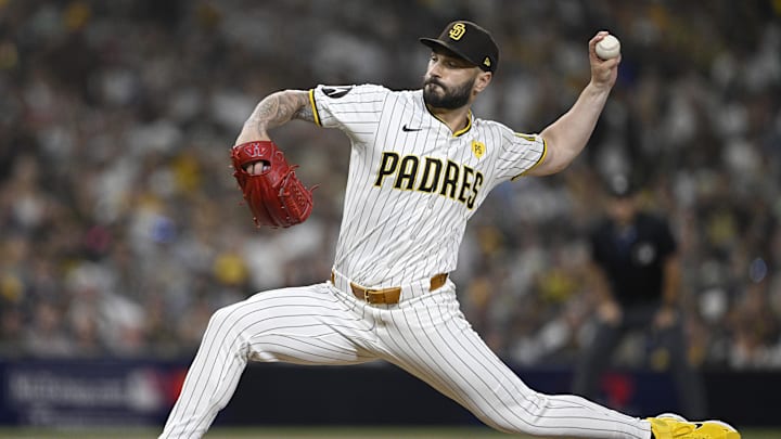 Oct 2, 2024; San Diego, California, USA; San Diego Padres pitcher Tanner Scott (66) throws during the sixth inning of game two in the Wildcard round for the 2024 MLB Playoffs against the Atlanta Braves at Petco Park. Oct 2, 2024; San Diego, California, USA; San Diego Padres pitcher Tanner Scott (66) throws during the sixth inning of game two in the Wildcard round for the 2024 MLB Playoffs against the Atlanta Braves at Petco Park.