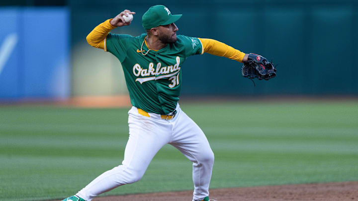 Aug 19, 2024; Oakland, California, USA; Oakland Athletics third baseman Abraham Toro (31) throws the ball during the third inning against the Tampa Bay Rays at Oakland-Alameda County Coliseum. Mandatory Credit: Stan Szeto-Imagn Images Aug 19, 2024; Oakland, California, USA; Oakland Athletics third baseman Abraham Toro (31) throws the ball during the third inning against the Tampa Bay Rays at Oakland-Alameda County Coliseum. Mandatory Credit: Stan Szeto-Imagn Images