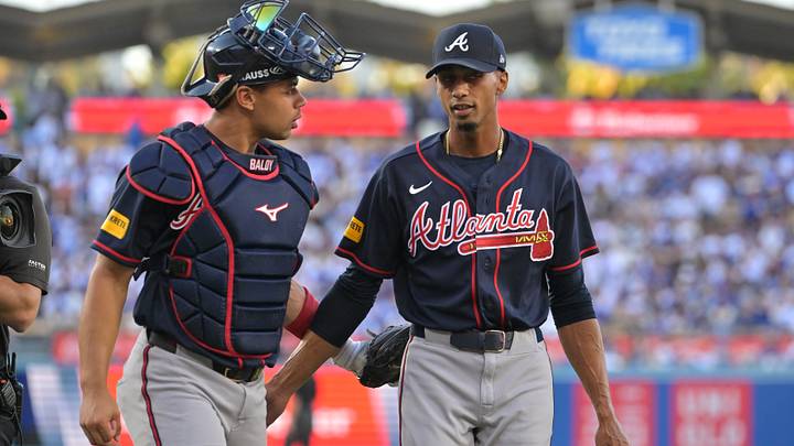Oct 4, 2026; Los Angeles, California, USA; Atlanta Braves catcher Drake Baldwin (30) talks to Atlanta Braves pitcher Ray Kerr (62) after the 2nd inning against the Los Angeles Dodgers in game two of the NLDS for the 2026 MLB Playoffs at Uniqlo Field at Dodger Stadium. Mandatory Credit: Jayne Kamin-Oncea-Imagn Images Oct 4, 2026; Los Angeles, California, USA; Atlanta Braves catcher Drake Baldwin (30) talks to Atlanta Braves pitcher Ray Kerr (62) after the 2nd inning against the Los Angeles Dodgers in game two of the NLDS for the 2026 MLB Playoffs at Uniqlo Field at Dodger Stadium. Mandatory Credit: Jayne Kamin-Oncea-Imagn Images