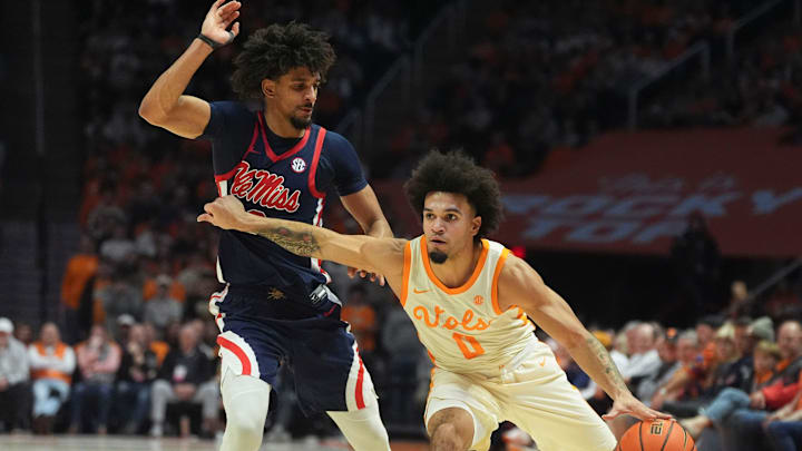 Tennessee guard Ja’Kobi Gillespie (0) moves the ball while guarded by Ole Miss guard Patton Pinkins (23) in an NCAA college basketball game on February 3, 2026, in Knoxville, Tennessee.