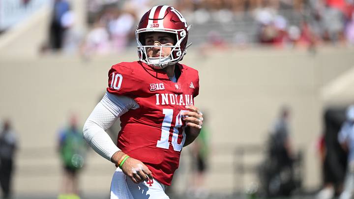 Sep 5, 2026; Bloomington, Indiana, USA; Indiana Hoosiers quarterback Josh Hoover (10) runs onto the field during the fourth quarter against the North Texas Mean Green at Merchants Bank Field at Memorial Stadium. Mandatory Credit: Robert Goddin-Imagn Images Sep 5, 2026; Bloomington, Indiana, USA; Indiana Hoosiers quarterback Josh Hoover (10) runs onto the field during the fourth quarter against the North Texas Mean Green at Merchants Bank Field at Memorial Stadium. Mandatory Credit: Robert Goddin-Imagn Images