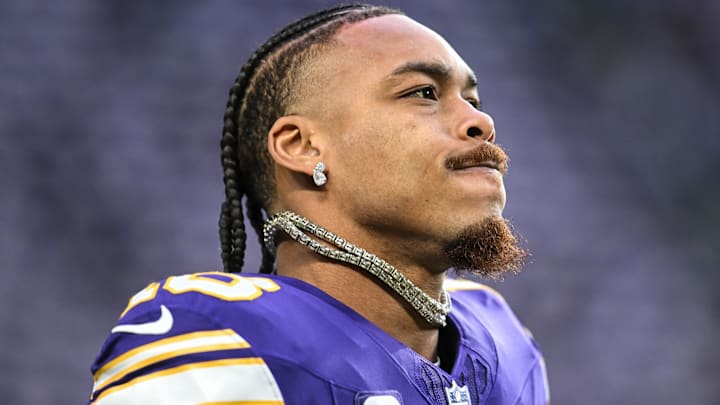 Minnesota Vikings wide receiver Justin Jefferson warms up prior to the game against the Green Bay Packers.