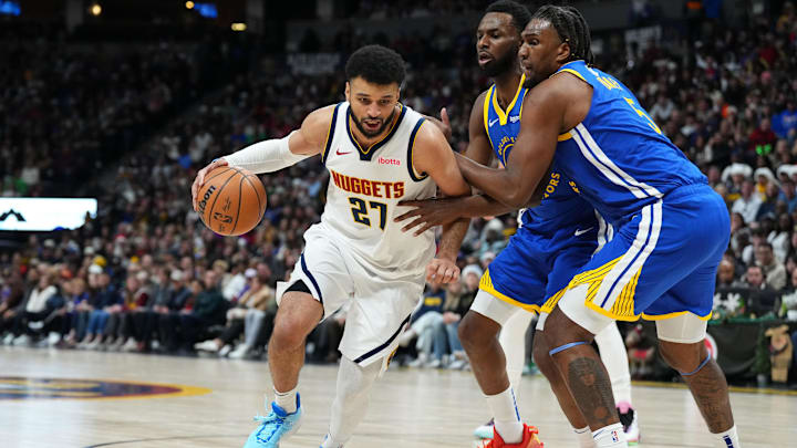 Denver Nuggets guard Jamal Murray (27) drives past Golden State Warriors