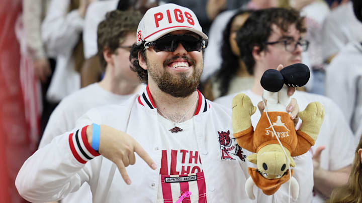 Feb 26, 2025; Fayetteville, Arkansas, USA; Arkansas Razorbacks student section fan prior to the game against the Texas Longhorns at Bud Walton Arena. Mandatory Credit: Nelson Chenault-Imagn Images