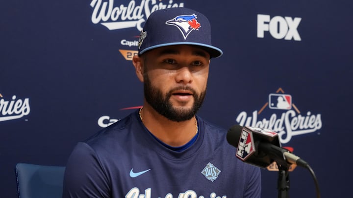 Oct 28, 2025; Los Angeles, California, USA; Toronto Blue Jays shortstop Isiah Kiner-Falefa (7) speaks in a press conference before game four of the 2025 MLB World Series against the Los Angeles Dodgers at Dodger Stadium. Mandatory Credit: Kirby Lee-Imagn Images