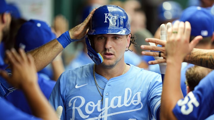 Aug 13, 2025; Kansas City, Missouri, USA; Kansas City Royals first baseman Vinnie Pasquantino (9) is congratulated by teammates after after hitting a home run during the fourth inning against the Washington Nationals at Kauffman Stadium. Mandatory Credit: Jay Biggerstaff-Imagn Images