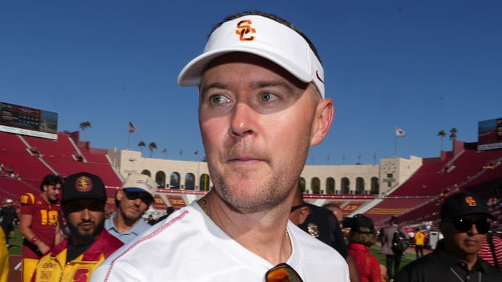 Sep 28, 2024; Los Angeles, California, USA; Southern California Trojans head coach Lincoln Riley reacts after a game against the Wisconsin Badgers at United Airlines Field at Los Angeles Memorial Coliseum. Sep 28, 2024; Los Angeles, California, USA; Southern California Trojans head coach Lincoln Riley reacts after a game against the Wisconsin Badgers at United Airlines Field at Los Angeles Memorial Coliseum.