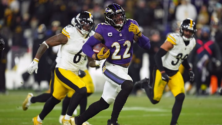 Jan 11, 2025; Baltimore, Maryland, USA; Baltimore Ravens running back Derrick Henry (22) runs to score a touchdown against the Pittsburgh Steelers in the third quarter in an AFC wild card game at M&T Bank Stadium. Mandatory Credit: Mitch Stringer-Imagn Images