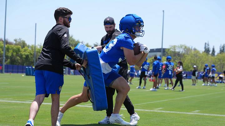 Jun 2, 2026; Woodland Hills, CA, USA; Los Angeles Rams running back Dean Connors (33) carries the ball during organized team activities at Rams Practice Facility. Mandatory Credit: Kirby Lee-Imagn Images Jun 2, 2026; Woodland Hills, CA, USA; Los Angeles Rams running back Dean Connors (33) carries the ball during organized team activities at Rams Practice Facility. Mandatory Credit: Kirby Lee-Imagn Images