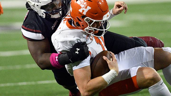 The Bearkat quarterback was sacked for a loss during a game against Sam Houston. The Bearkat quarterback was sacked for a loss during a game against Sam Houston.