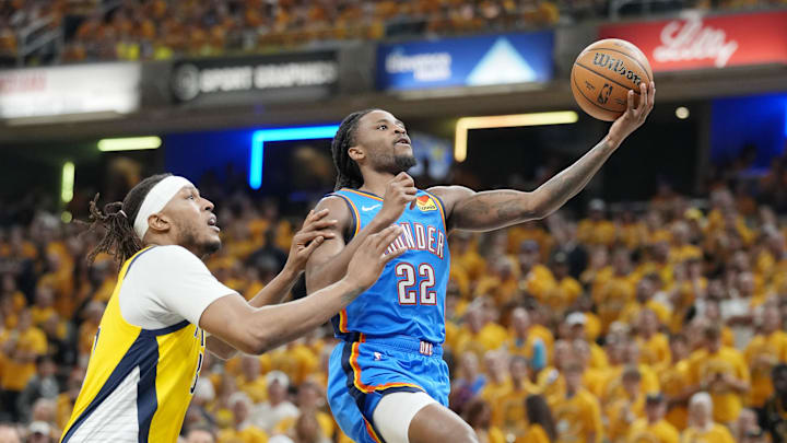 Jun 13, 2025; Indianapolis, Indiana, USA; Oklahoma City Thunder guard Cason Wallace (22) shoots the ball against Indiana Pacers center Myles Turner (33) during the first half during game four of the 2025 NBA Finals at Gainbridge Fieldhouse. Mandatory Credit: Kyle Terada-Imagn Images Jun 13, 2025; Indianapolis, Indiana, USA; Oklahoma City Thunder guard Cason Wallace (22) shoots the ball against Indiana Pacers center Myles Turner (33) during the first half during game four of the 2025 NBA Finals at Gainbridge Fieldhouse. Mandatory Credit: Kyle Terada-Imagn Images