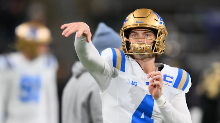 Nov 15, 2024; Seattle, Washington, USA; UCLA Bruins quarterback Ethan Garbers (4) throws the ball during warmups before the game against the Washington Huskies at Alaska Airlines Field at Husky Stadium. Mandatory Credit: Steven Bisig-Imagn Images