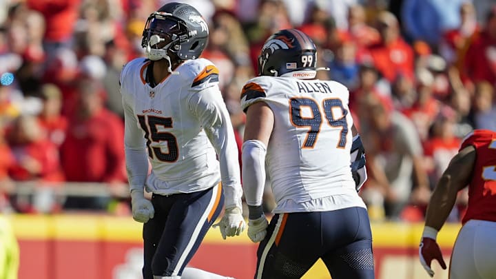 Nov 10, 2024; Kansas City, Missouri, USA; Denver Broncos linebacker Nik Bonitto (15) celebrates after a play during the first half against the Kansas City Chiefs at GEHA Field at Arrowhead Stadium. 