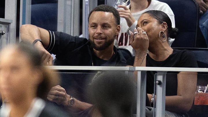Golden State Warriors star Stephen Curry and his wife Ayesha take in a Golden State Valkyries game against the Los Angeles Sparks at Chase Center.