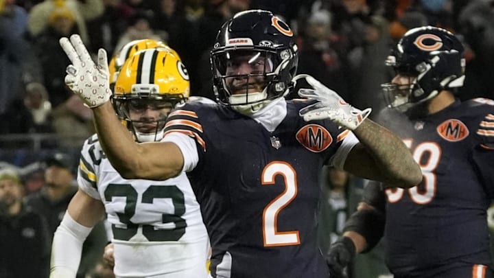 Jan 10, 2026; Chicago, IL, USA;  Chicago Bears wide receiver DJ Moore (2) reacts after making a first down catch against the Green Bay Packers during the first half of an NFC Wild Card Round game at Soldier Field. Mandatory Credit: David Banks-Imagn Images