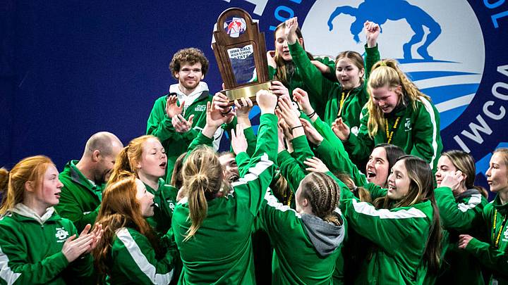Osage wrestlers celebrate with their third place team trophy in the finals during of the Iowa Wrestling Coaches and Officials Association (IWCOA) girls' state wrestling tournament, Saturday, Jan. 22, 2022, at the Xtream Arena in Coralville, Iowa.

220121 Girls Iwcoa State Finals Wr 048 Jpg