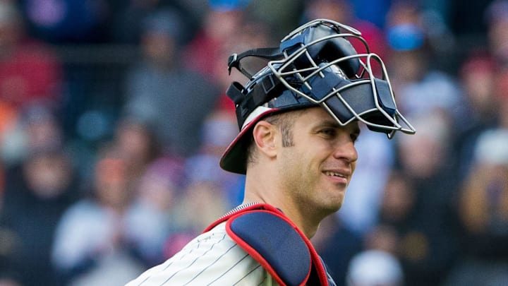 Sep 30, 2018; Minneapolis, MN, USA; Minnesota Twins catcher Joe Mauer (7) puts the ball in his back pocket as he leaves the field in the ninth inning against Chicago White Sox at Target Field. Mandatory Credit: Brad Rempel-Imagn Images