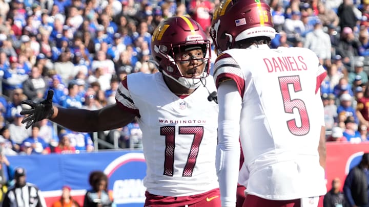 Nov 3, 2024; East Rutherford, New Jersey, USA; Washington Commanders wide receiver Terry McLaurin (17) after a 1st quarter towchdown reception from quarterback Jayden Daniels (5) against the New York Giants at MetLife Stadium. Nov 3, 2024; East Rutherford, New Jersey, USA; Washington Commanders wide receiver Terry McLaurin (17) after a 1st quarter towchdown reception from quarterback Jayden Daniels (5) against the New York Giants at MetLife Stadium.