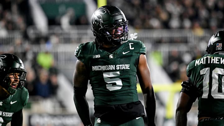 Michigan State's Jordan Hall celebrates after a stop against Michigan during the second quarter on Saturday, Oct. 25, 2025, at Spartan Stadium in East Lansing.
