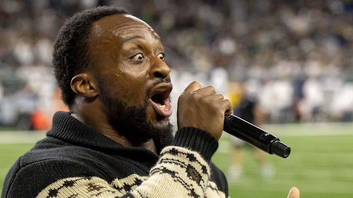 Nov 24, 2023; Detroit, Michigan, USA; Ettore Ewen also know as Big E in the WWE wrestling world hypes the fans during the second half game between the Michigan State Spartans and the Penn State Nittany Lions at Ford Field. Mandatory Credit: David Reginek-Imagn Images