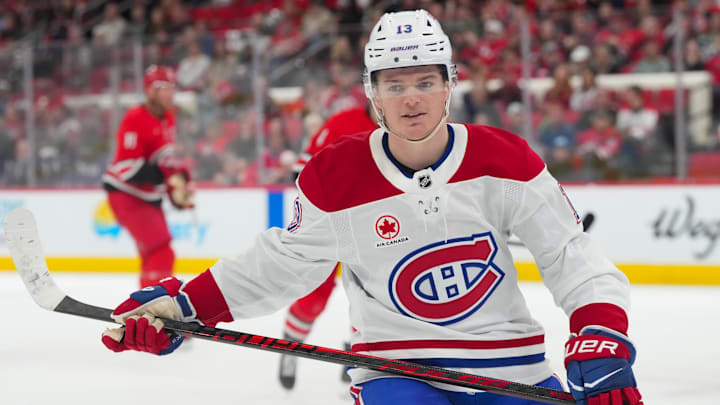 Mar 29, 2026; Raleigh, North Carolina, USA;  Montreal Canadiens right wing Cole Caufield (13) scores a goal against the Carolina Hurricanes during the second period at Lenovo Center. Mandatory Credit: James Guillory-Imagn Images