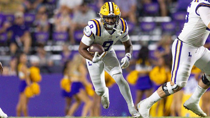 Sep 28, 2024; Baton Rouge, Louisiana, USA;  LSU Tigers safety Ju’Juan Johnson (8) runs against the South Alabama Jaguars during the second half at Tiger Stadium. Mandatory Credit: Stephen Lew-Imagn Images